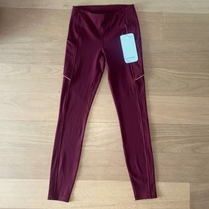 Lululemon Burgundy leggings. With pockets. Size 4. New with tags